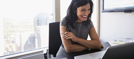 Business Woman Office Smiling on Computer